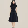 Ivy Skirt màu đen LINHDINH Studio nền beige nhẵn